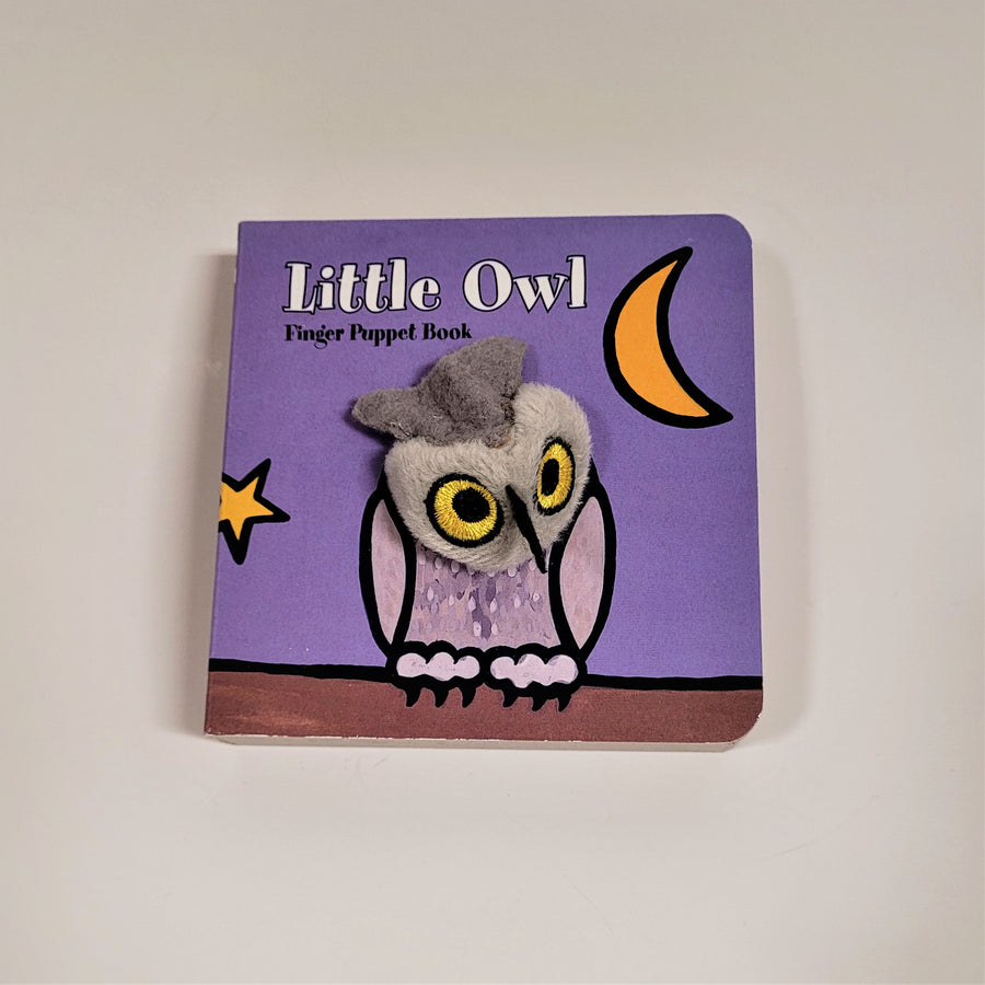 Little Owl finger puppet book with cloth head of owl coming out of the flat book cover. Owl head is gray with a purplish-gray body and black accents drawn branch with a purple night-sky a quarter moon and a star in the background.