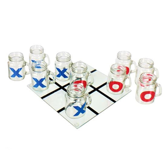 Glass game board with blue x-painted glasses and red o-painted glasses all spread out across board