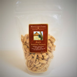 Standing bag of Mapleland Farms Maple Roasted Peanuts with label top-centered and peanuts showing through the clear plastic bag.