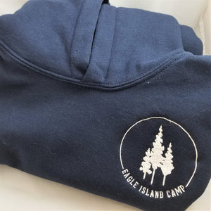 Folded pullover hoodie close up of top with white Eagle Island logo on the right.