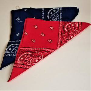 Workman's handkerchief scarves, trifolded red with paisley design on top of navy blue with same design