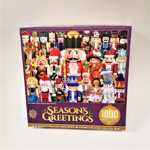 Box cover of 1000 piece jigsaw puzzle featuring Nutcrackers of all kinds standing in 3 rows with a traditional Nutcracker in the middle. Lots of red and golds in the full-color display.