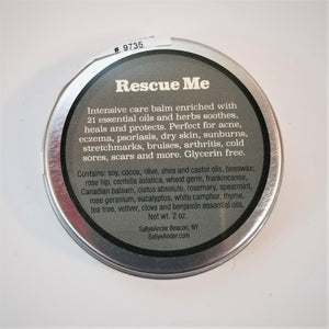 Bottom of the Rescue Me circular tin with text on what it is made from on a gray background.