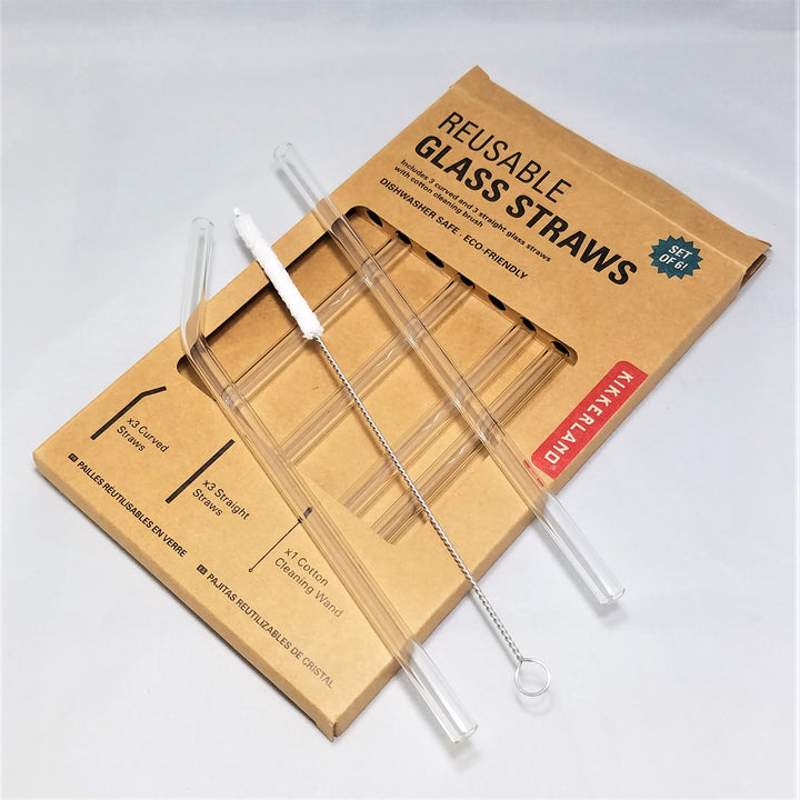 Box of glass straws with 3 pieces set on top--one straight straw, one cleaning stick, one bent straw.