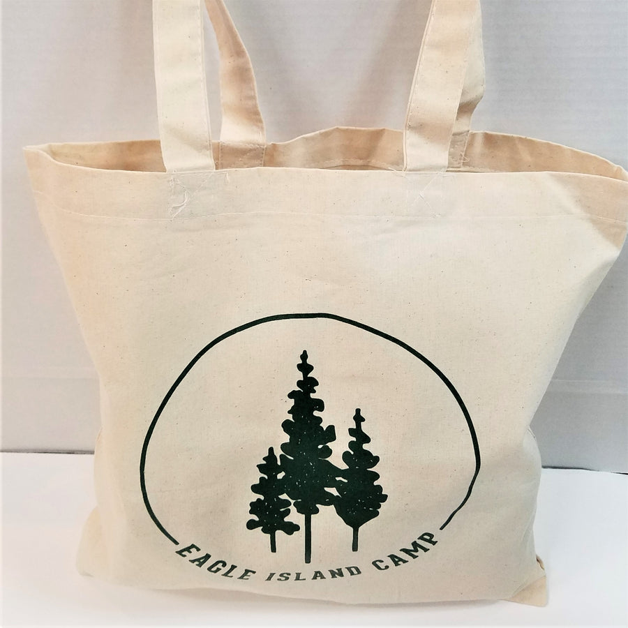 Cream-colored tote standing upright with green Eagle Island logo centered closer to the bottom of the tote.