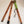Close up of 3 pieces of walking stick unassembled. Top far right, bottom center, middle to the left.