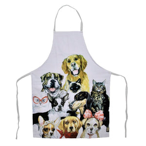 Open white apron with dogs and cats faces painted on in browns, blacks, white, with some pink and red accessories