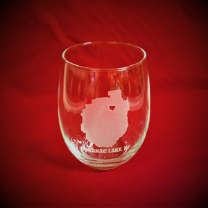 Wine glass alone on the red back ground with the Adirondack Park and red heart for Saranac Lake clearly visible.